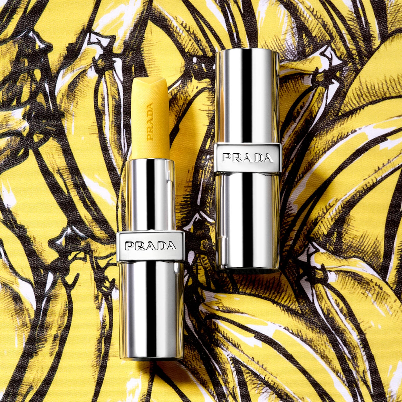 Бальзам Prada Beauty Hydrating Lip Balm with Jojoba Oil у відтінку U002 Banana Yellow Бальзам Prada Beauty Hydrating Lip Balm with Jojoba Oil у відтінку U002 Banana Yellow